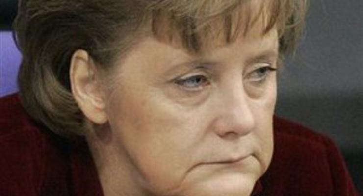 Меркель выступила в защиту соглашения о помощи банкам