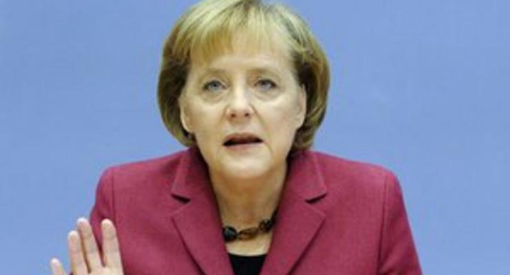 DW: Меркель критикует открытое письмо экономистов