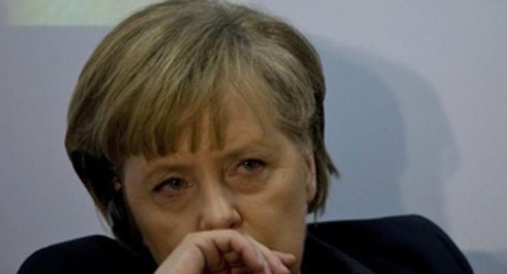 Меркель пообещала сделать все, чтобы сохранить евро