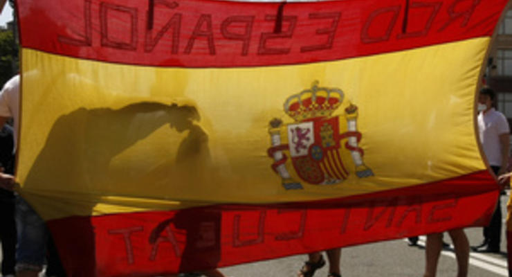 Испанцы надеются с помощью Меркель победить кризис