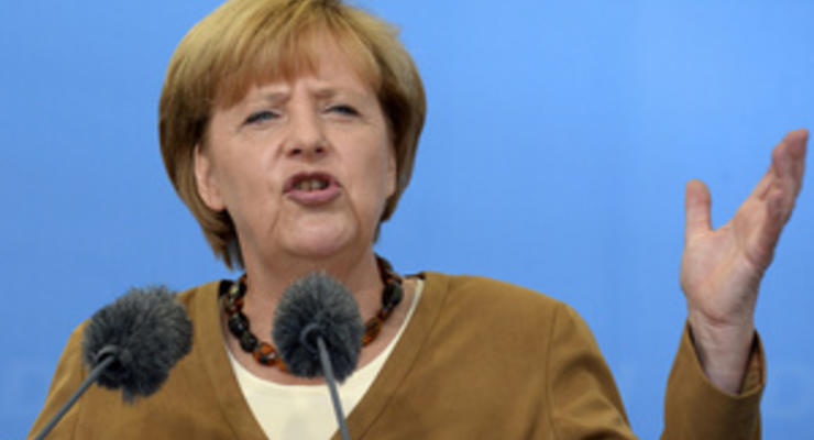 Меркель выступила против списания части долгов Греции
