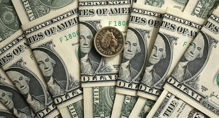 Курс доллара немного вырос к закрытию межбанка