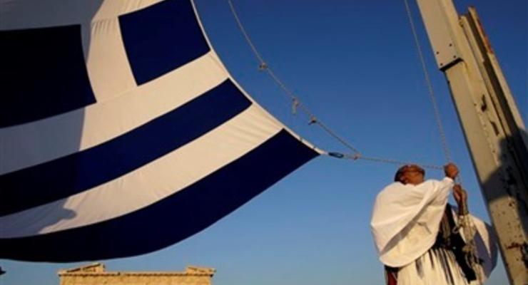 Fitch понизило прогноз по кредитному рейтингу Греции