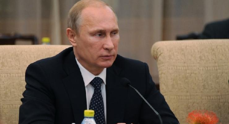 Путин в два раза увеличил военные расходы - Bloomberg