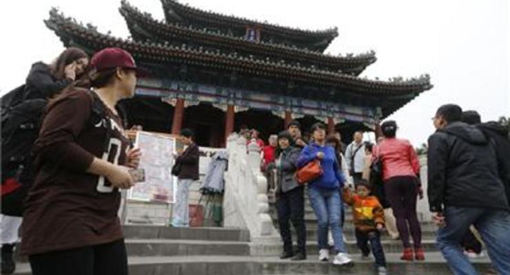 КНР впервые выпустила долговые бумаги в юанях за рубежом