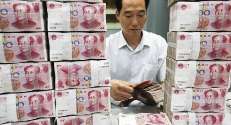 Почему МВФ закрутил роман с юанем