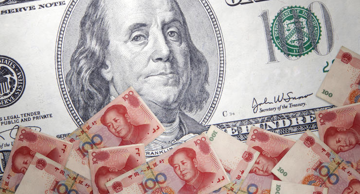 Юань обновил шестилетний минимум к доллару