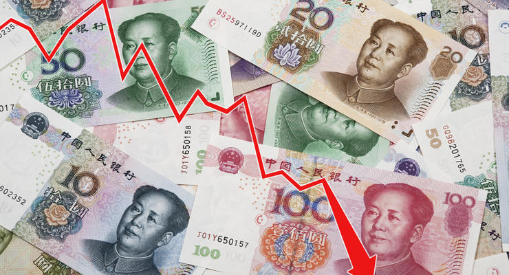 Курс юаня упал до шестилетнего минимума