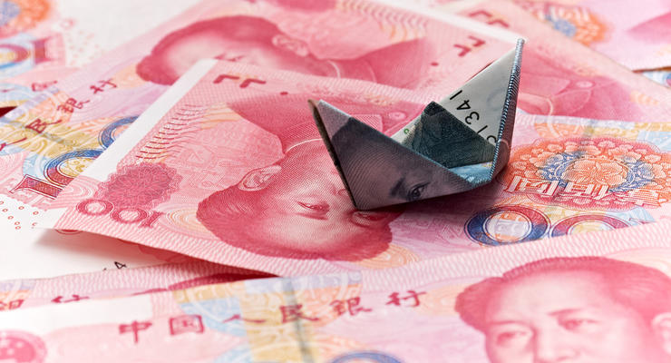 Центробанк Китая повысил справочный курс юаня на 0,3%